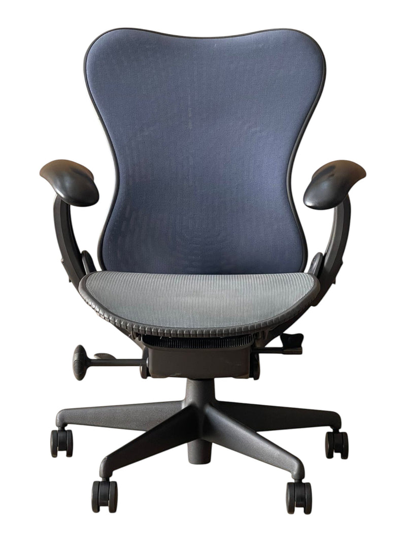 Refurbished Herman Miller Mirra Triflex ergonomic chair in navy and graphite
Herman Miller Mirra fully adjustable office chair front view
Navy Herman Miller Mirra chair with graphite Triflex back
Refurbished Herman Miller ergonomic office chair UK
Herman Miller Mirra Triflex adjustable armrests and lumbar support
Graphite Herman Miller Mirra office chair rear view
Fully adjustable Mirra chair for home and commercial offices