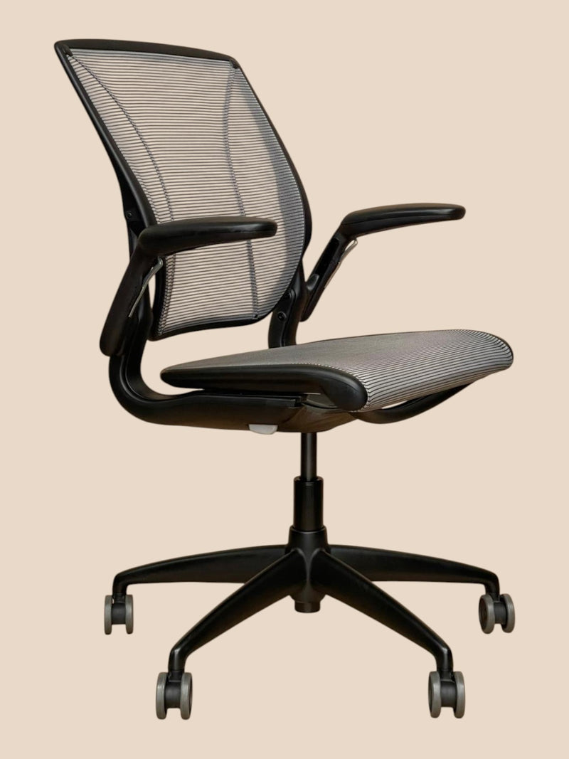 Refurbished Office Furniture Humanscale Diffrient World ergonomic chair in grey mesh with a black frame and castor base